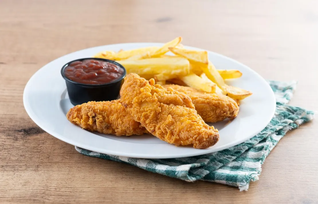 Hand-breaded chicken tenders with signature dipping sauce at Wings 4 U London